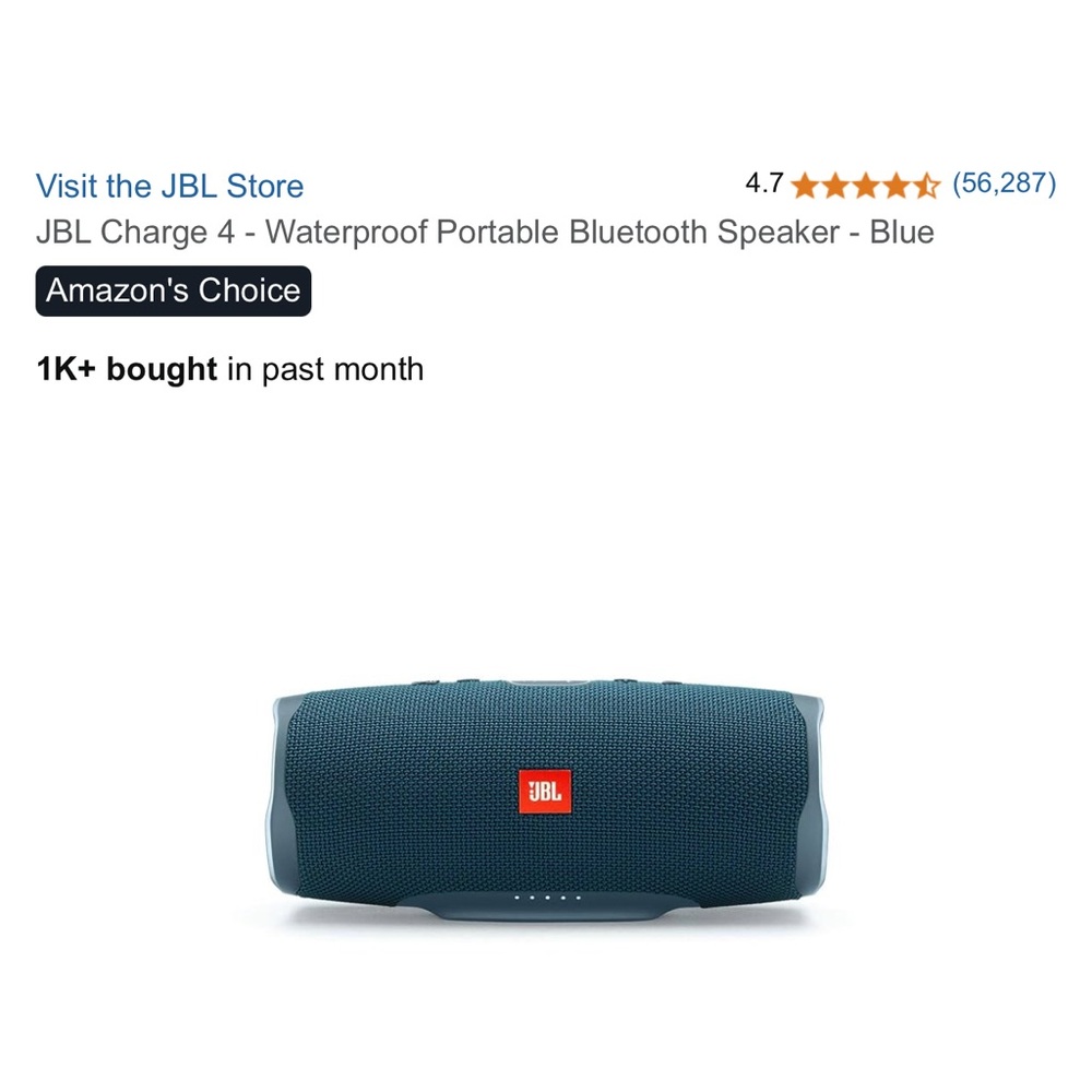BARELY USED WITH CHARGER…  JBL Blue Portable Speaker with Waterproof Design.